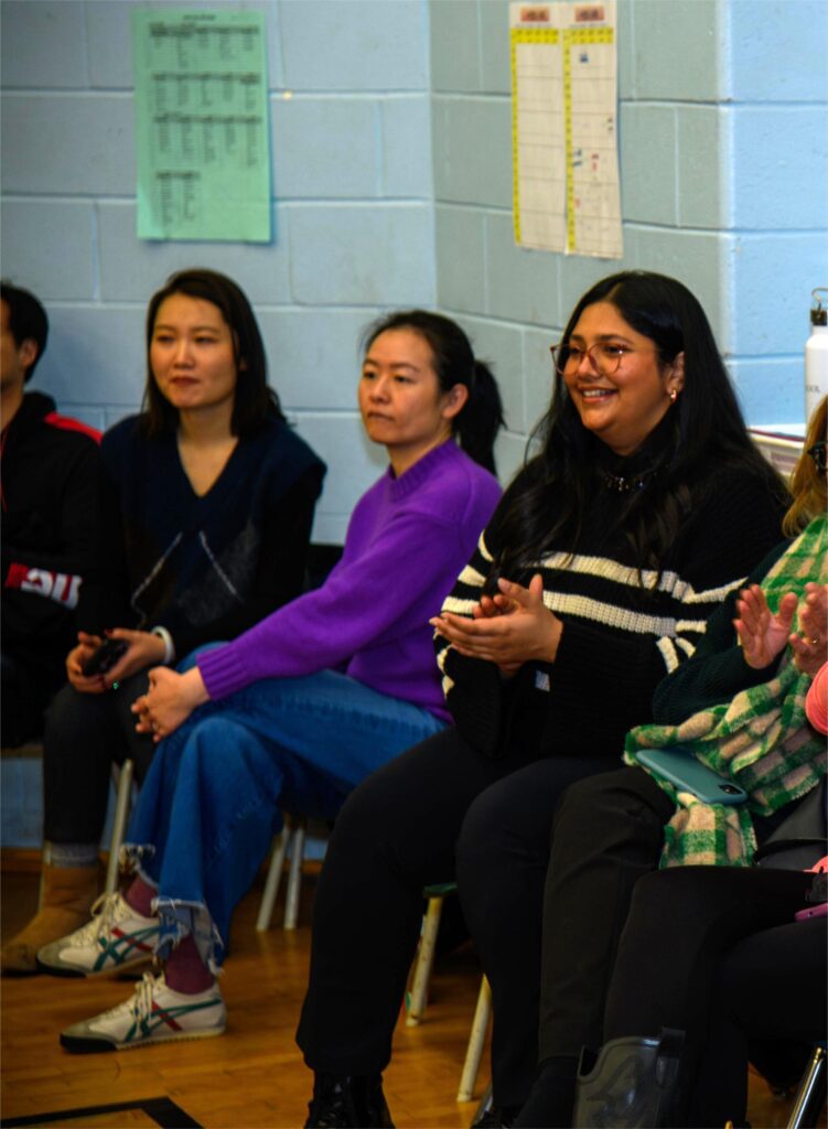 Amatullah at an event at The Giles School with other teachers.