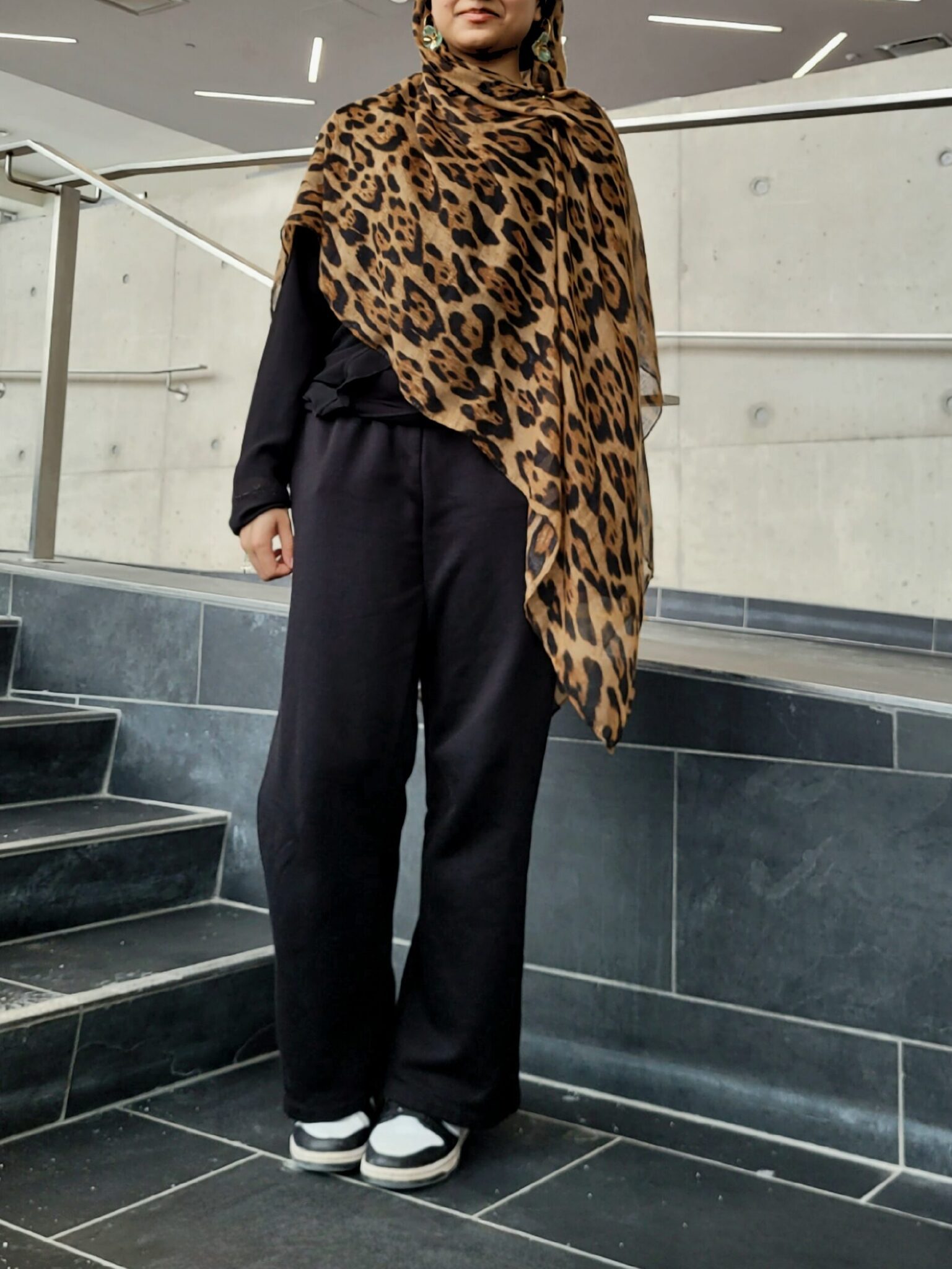 Student wearing baggy clothes with chic elements
