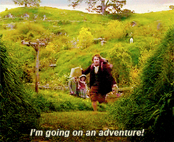 A man running in the forest and saying "I'm going on an adventure."