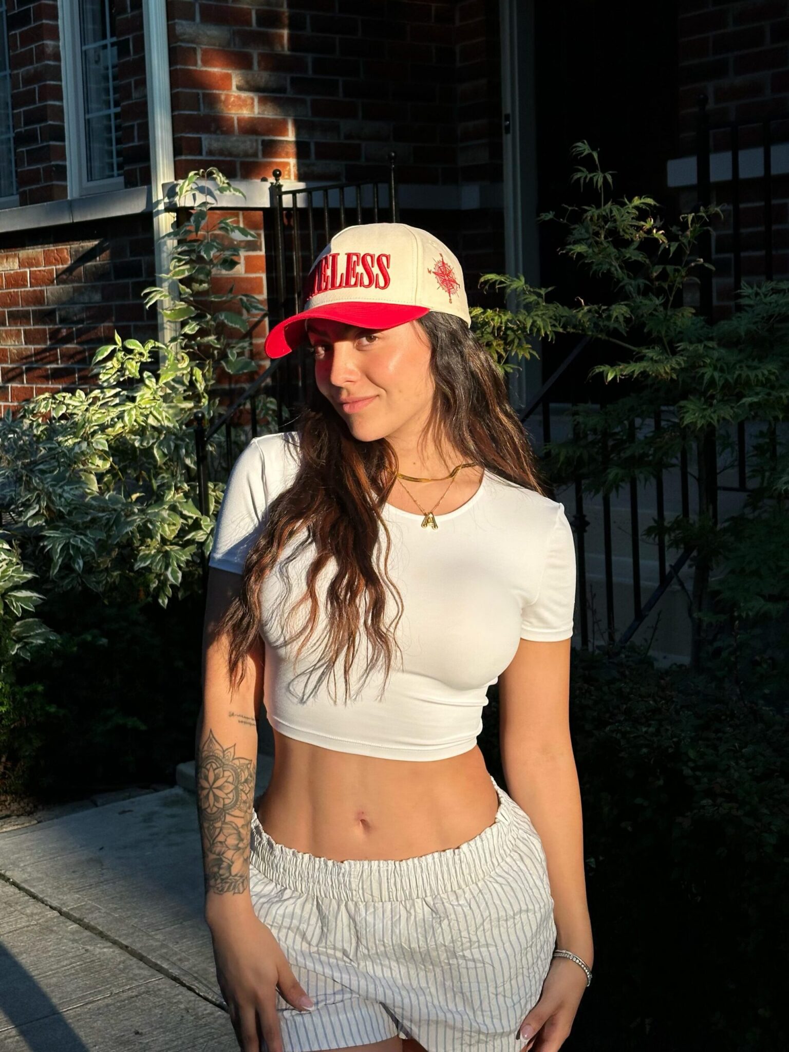 Student wearing statement outfit with crop top, shorts and accessories