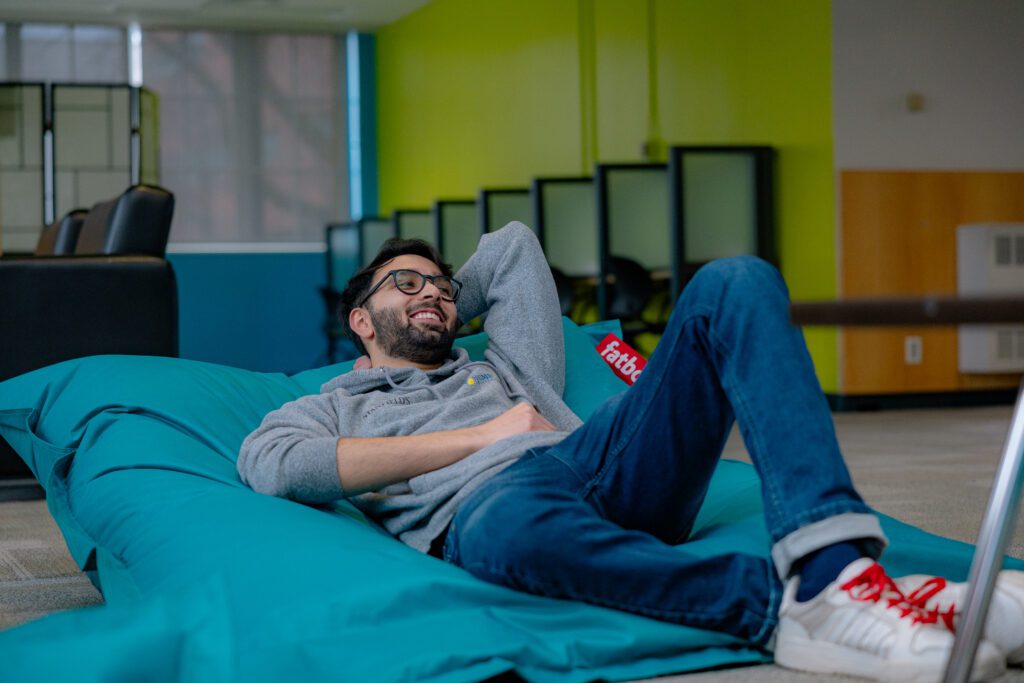 A student relaxing in the Humber Zen Zone.