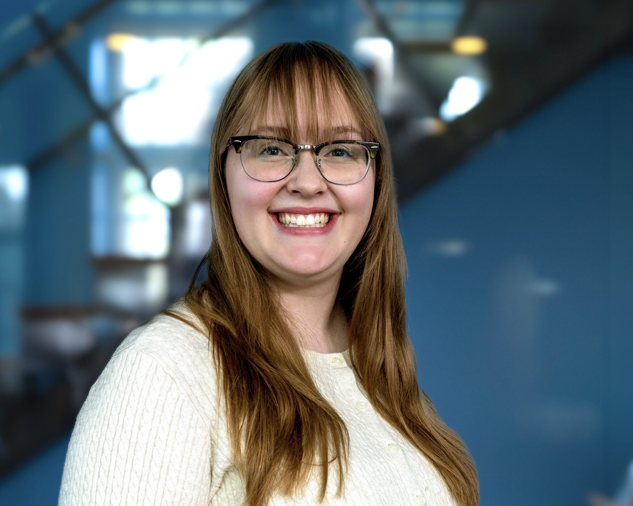 IGNITE Student Advocate Emily at Humber College smiling indoors on campus