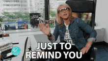 A woman saying,"just to remind you"