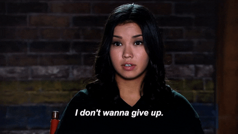 A woman saying "I don't wanna give up."