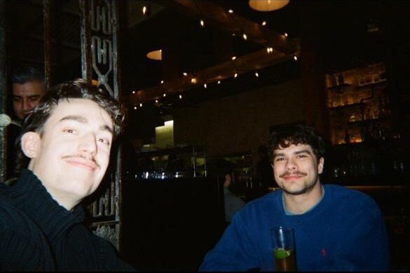 Guys best friends having dinner
