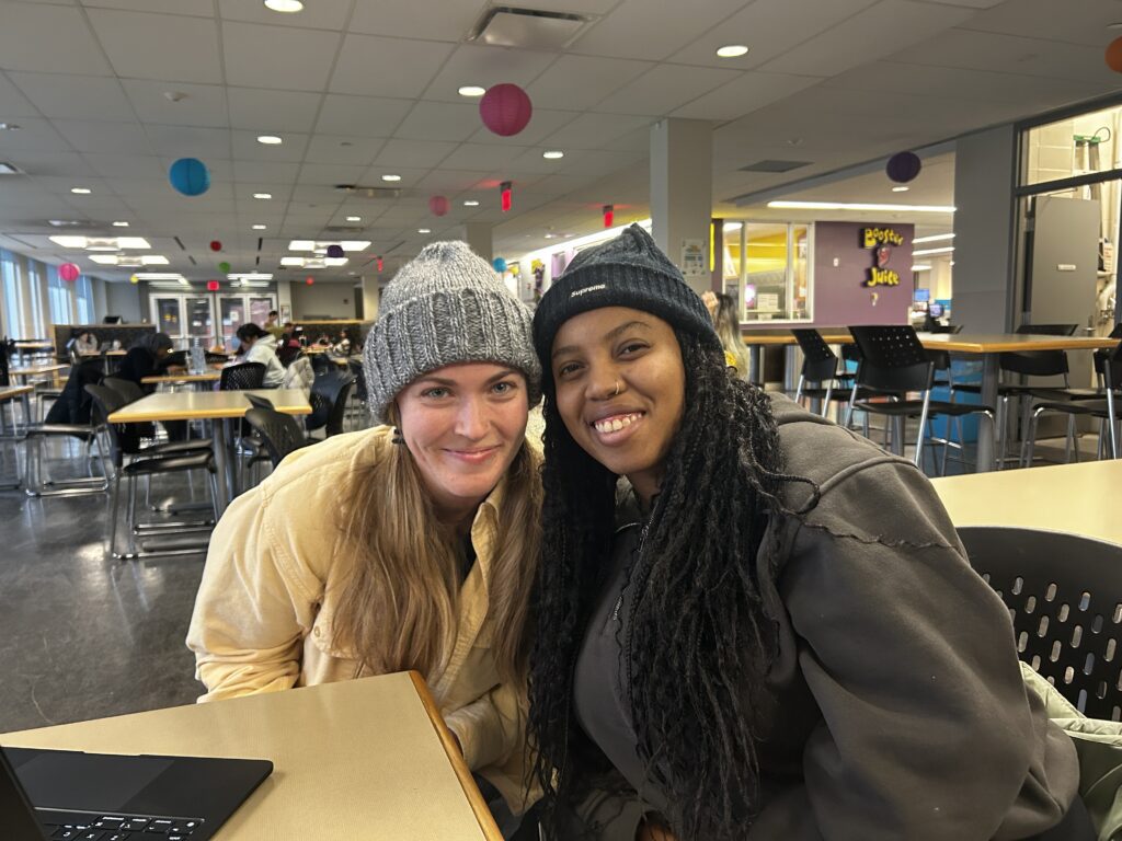 Landscape shot of Holly Wilson on the left and Tamoya Thompson on the right.