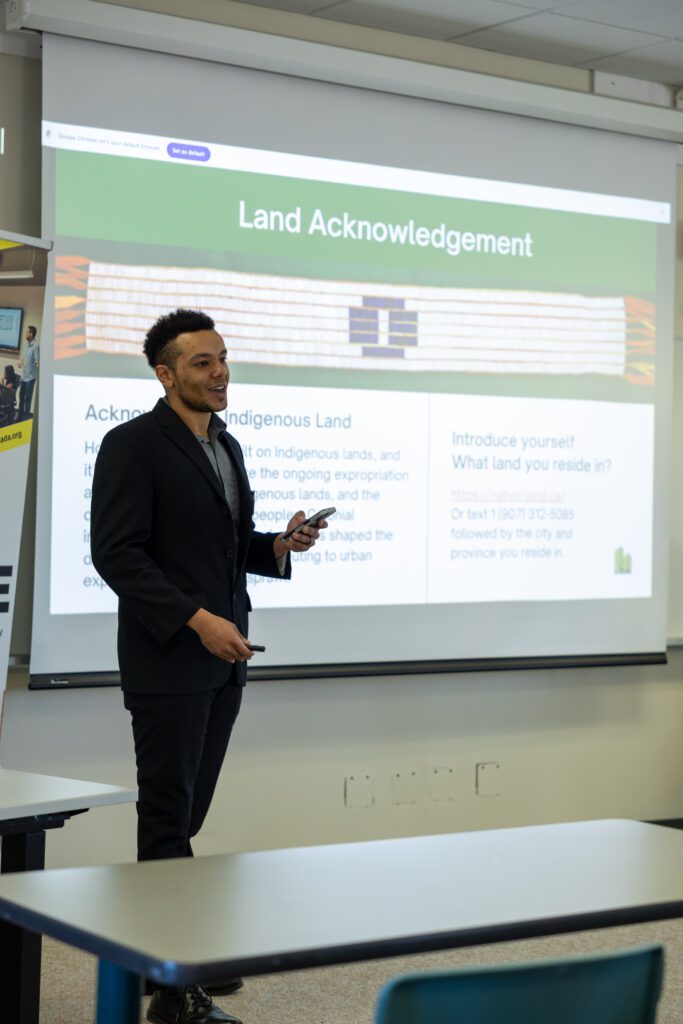 A man is giving a presentation