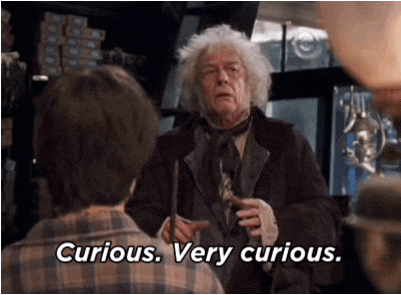 An old man with wild white hair and speaks to a young boy, with the caption "Curious. Very curious."