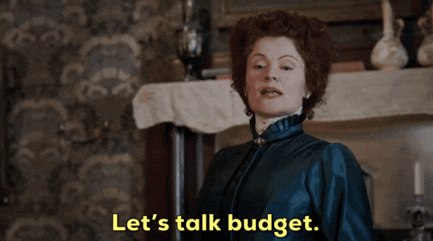 A woman saying, "Let's talk budget."