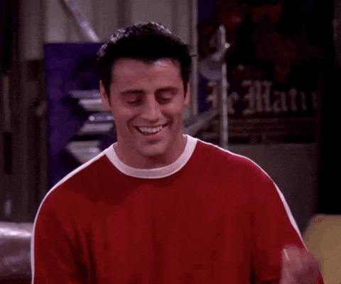 Joey Tribianni pointing to his head saying his head is not just a hat rack