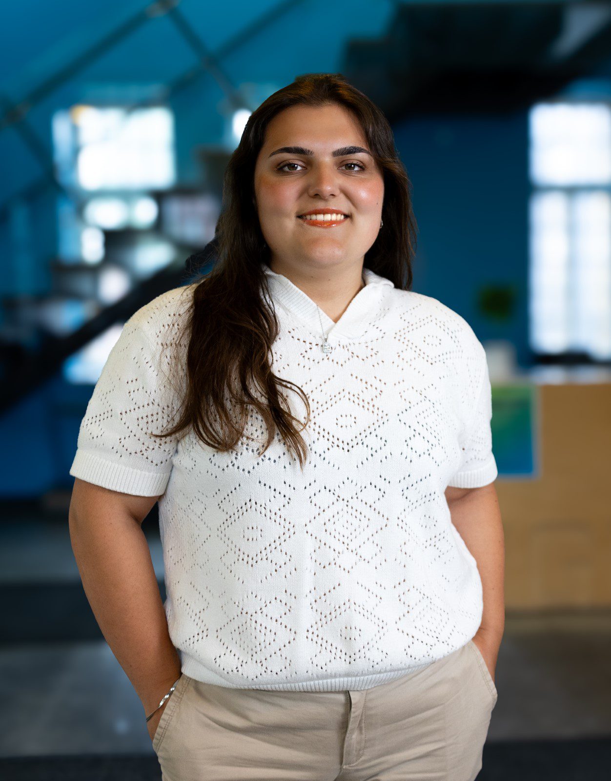 IGNITE Student Advocate Selena at Humber College smiling indoors on campus.
