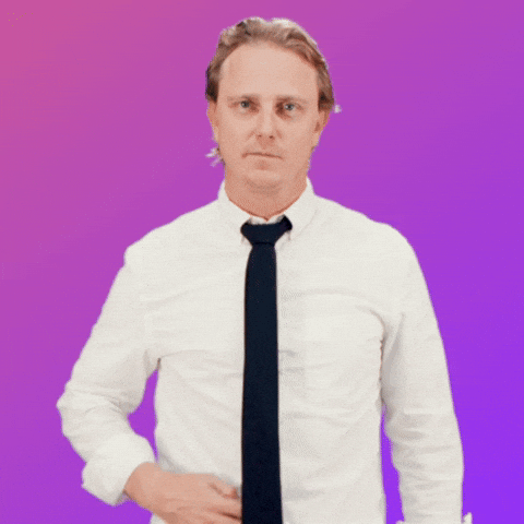 A man putting his tie to the back and cracking his fingers. The sentence "Let's do this" pops up on the screen.