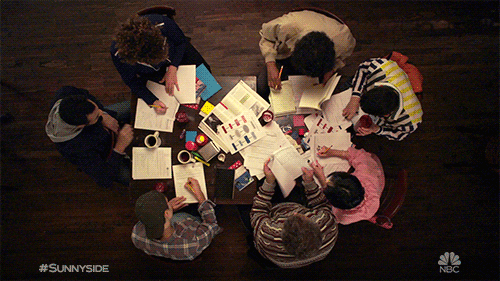 a group of people studying