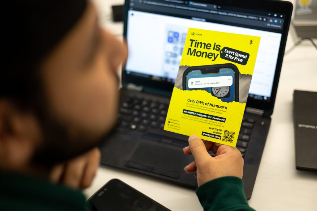 A man is holding the 'Time Is Money' campaign brochure. 