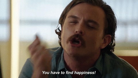 A man saying "You have to find happiness!"
