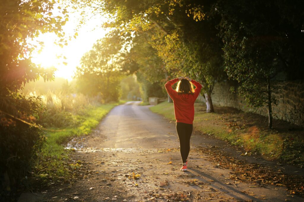 Woman walking on a path during daytime