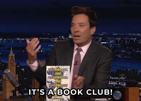 A man is saying the words, "IT'S A BOOK CLUB!"