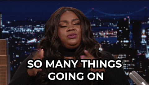 A woman is saying the words, "SO MANY THINGS GOING ON"