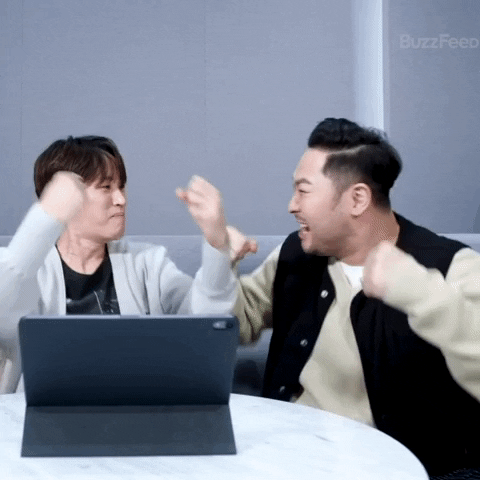 Two men are excitedly shouting the words, “BEST FRIENDS FOREVER!”