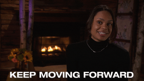 A woman is saying the words "KEEP MOVING FORWARD."