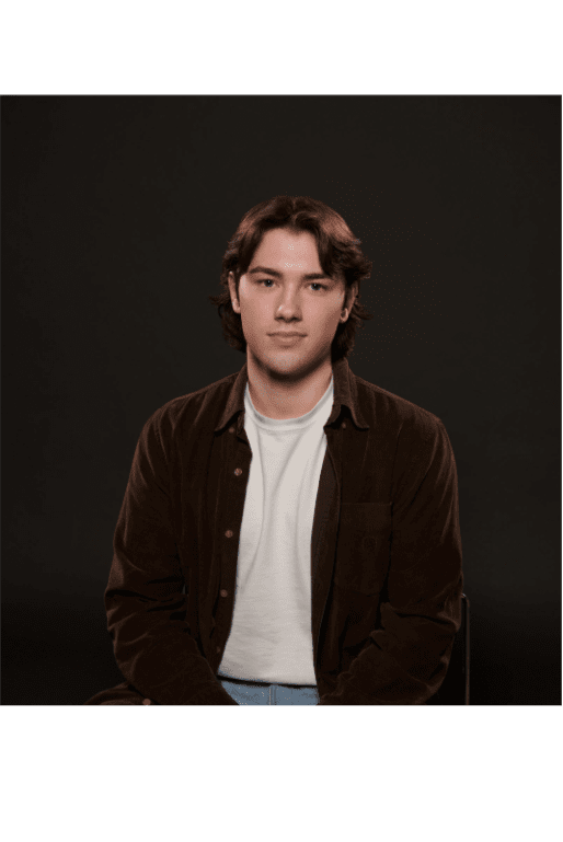 A man is sitting. 