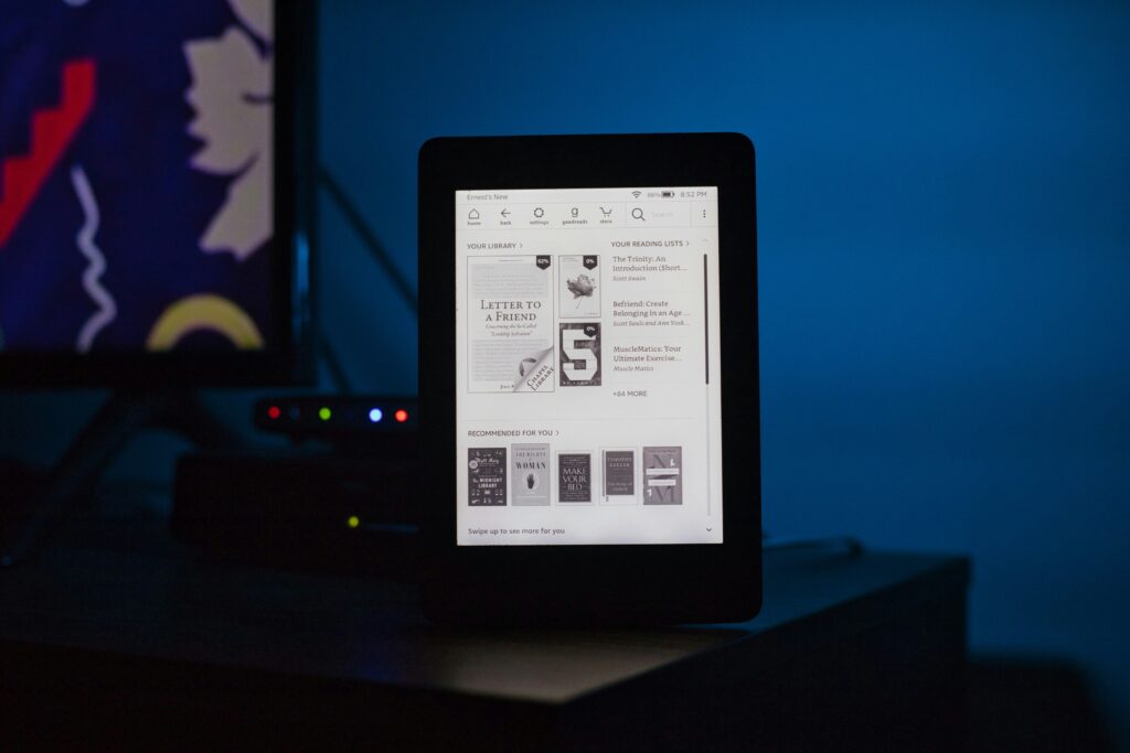 Tablet showing multiple digital reading options like e-books and articles.