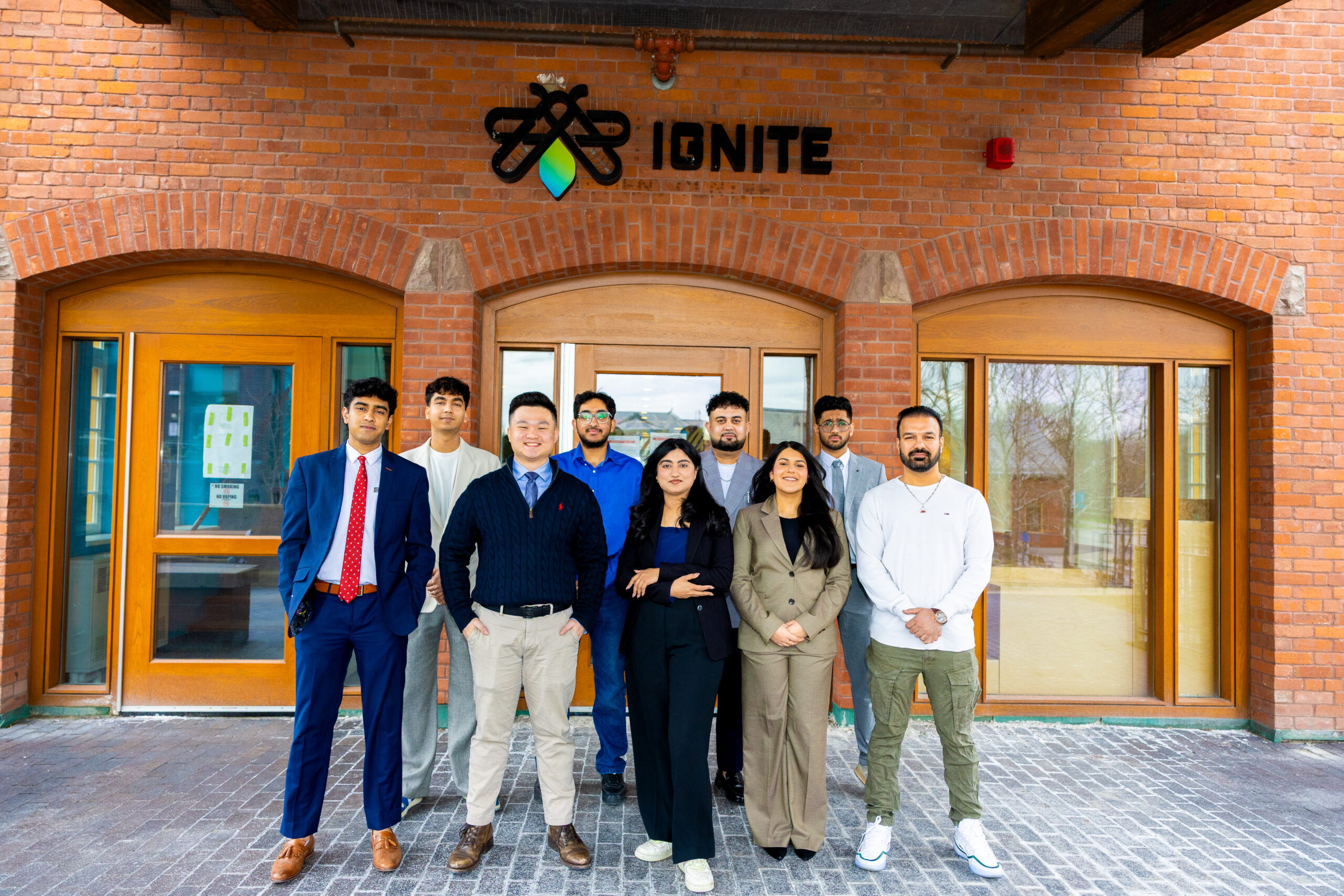 Picture of the 2026-27 IGNITE Board of Directors in front of the IGNITE Office.