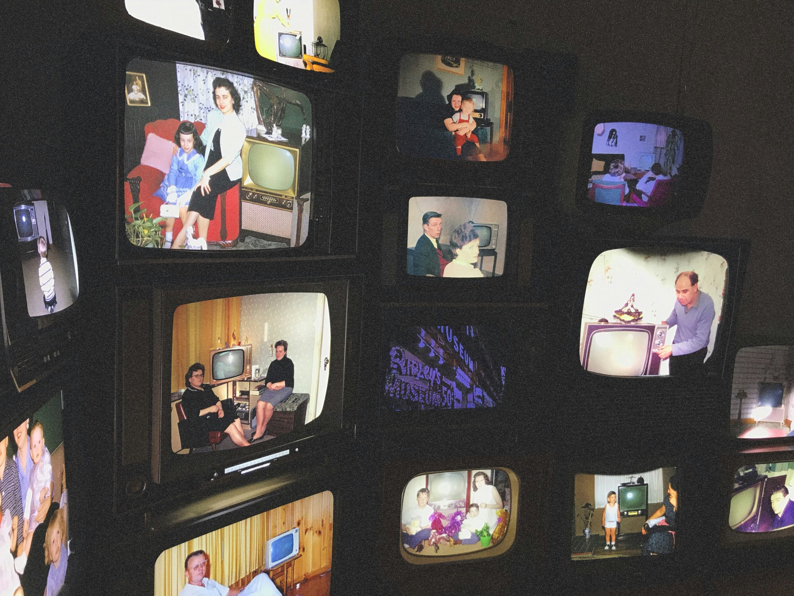 Many Tv screens displaying various medias