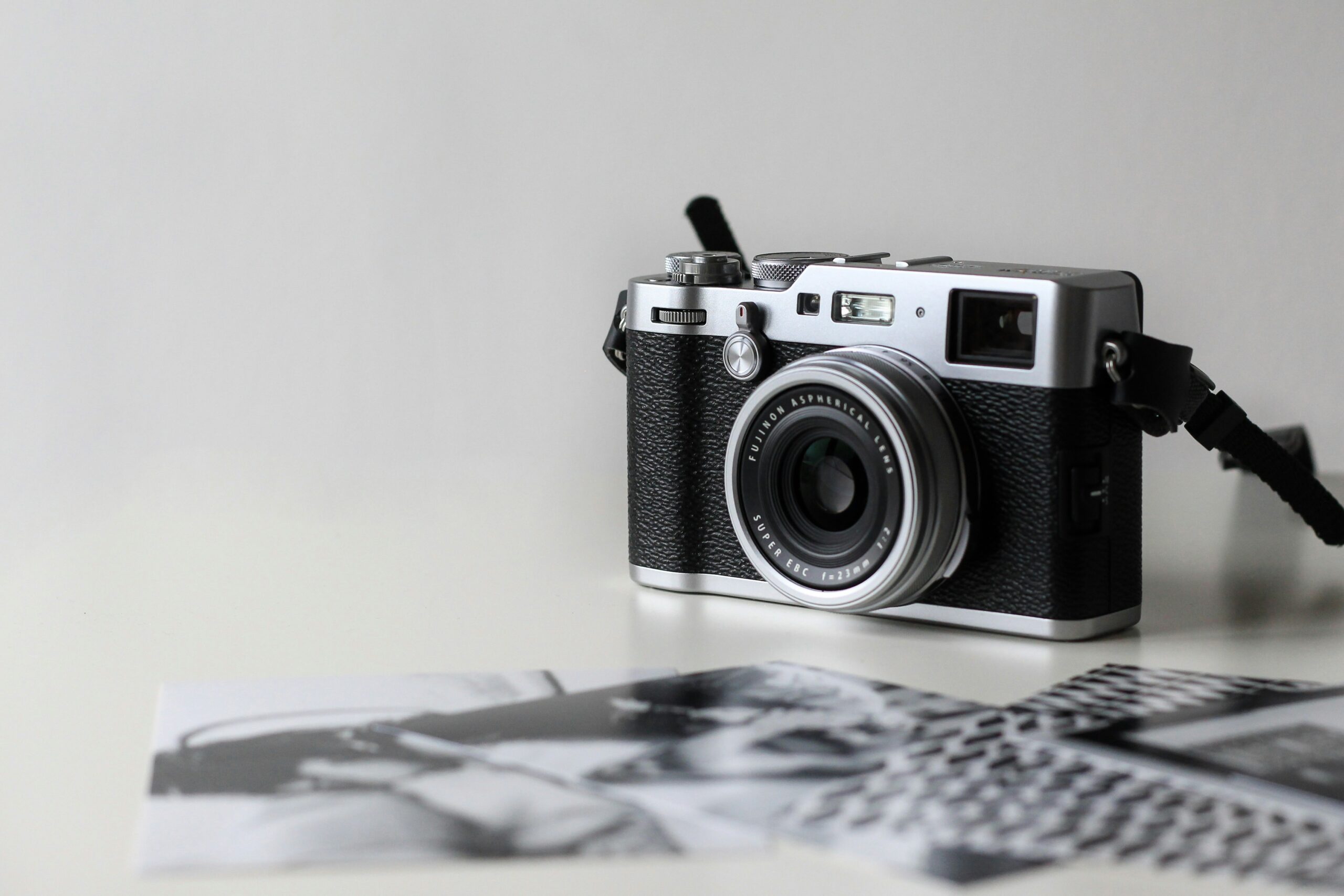 A camera with photos around it