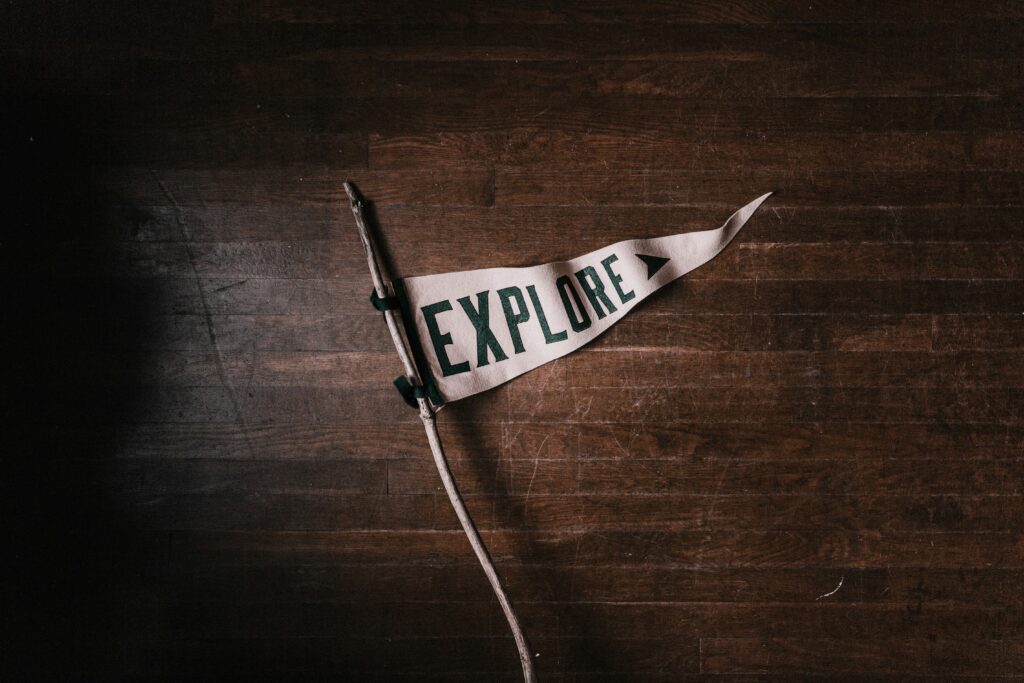 A small flag with the word "explore" written on it