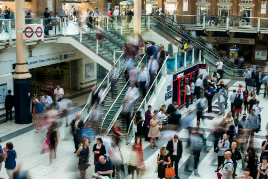 A blurry image of a busy train station