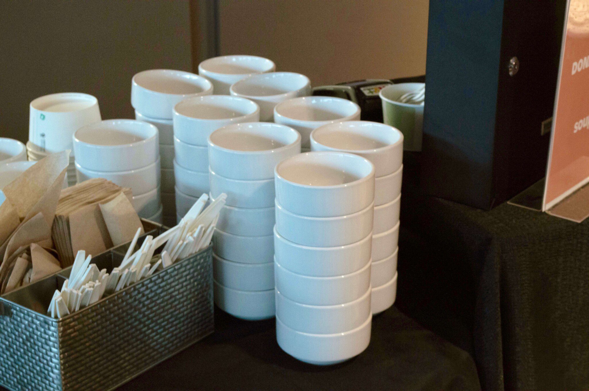 soup bowls piled on top of each other in uniform stacks