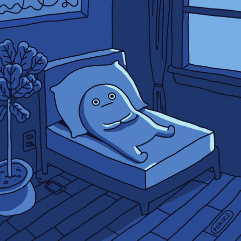 A cartoon person lays awake in bed.