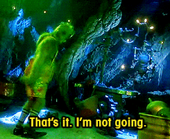 Movie scene from The Grinch Who Stole Christmas featuring the Grinch walking out of frame frustratedly with the text "That's it. I'm not going." written in yellow text across the bottom.