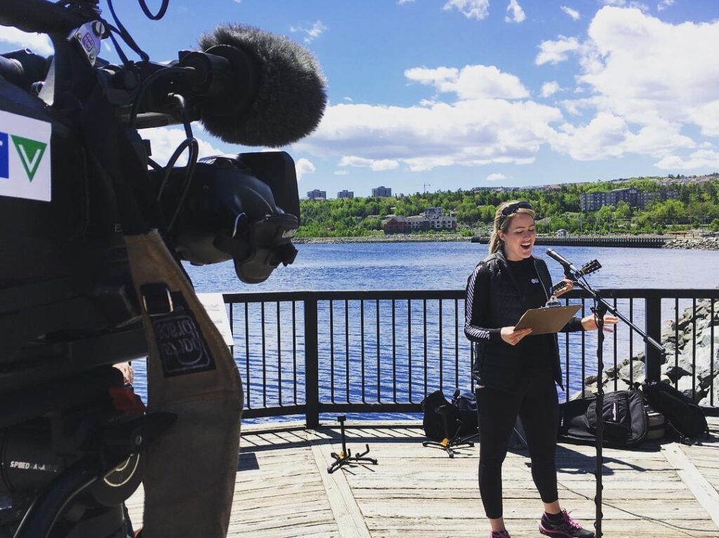 Picture of Heather Butts covering a story.