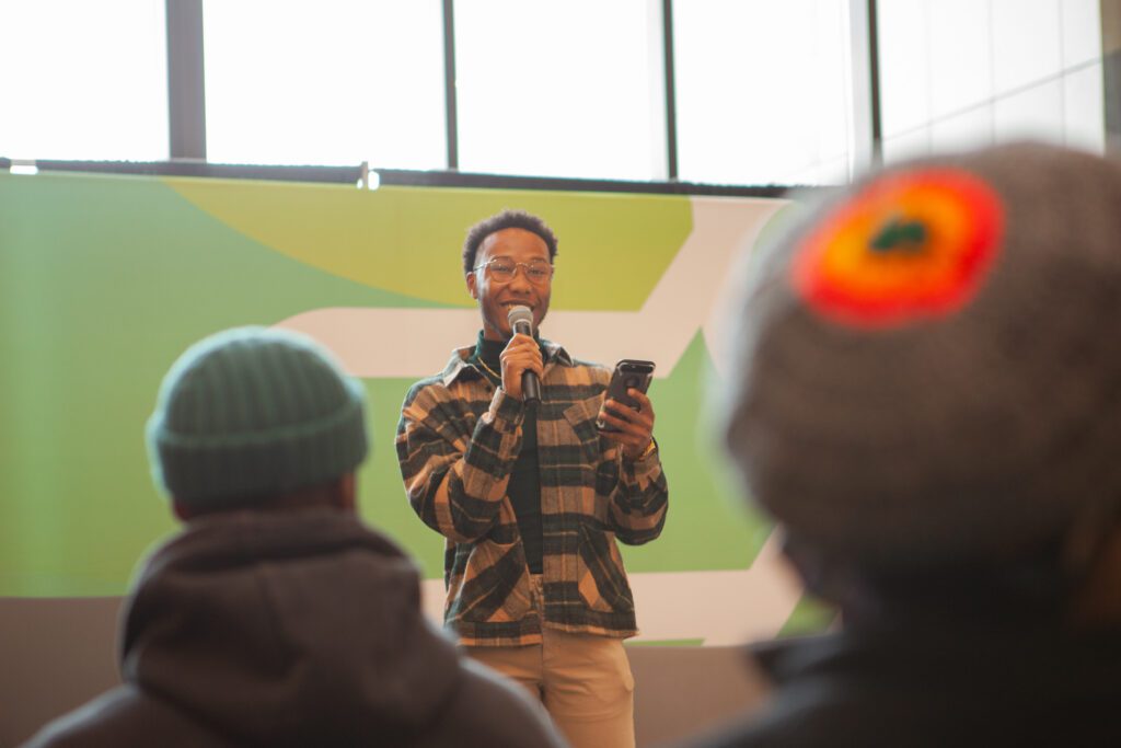 A student saying a speech at the Black Excellence Conference.