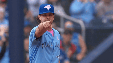 A man pointing and nodding