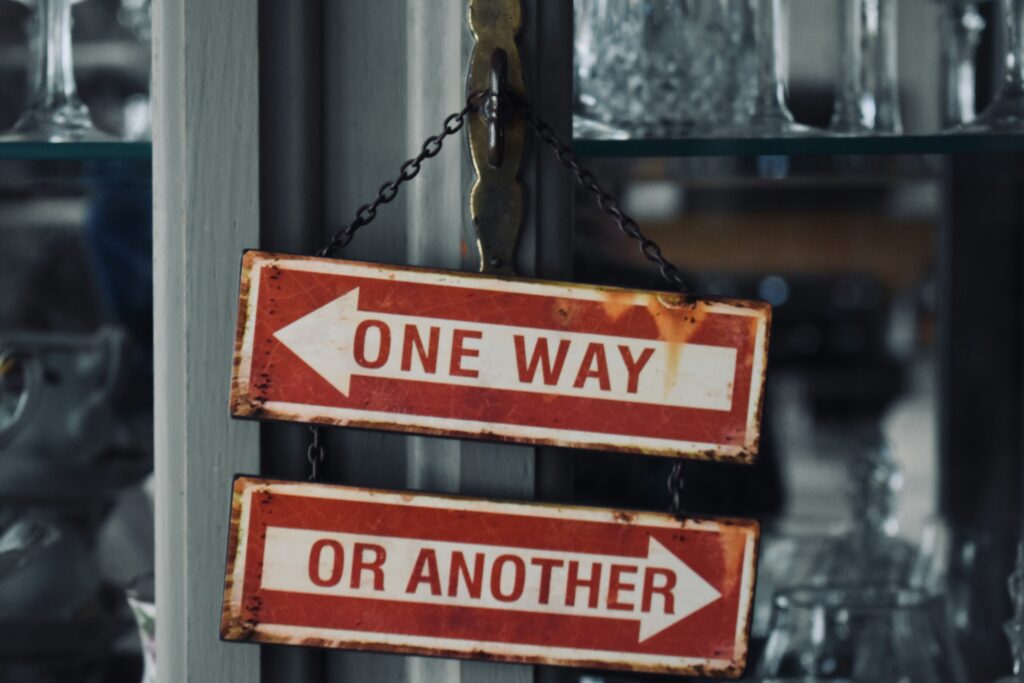 A sign reading 'one way or another'