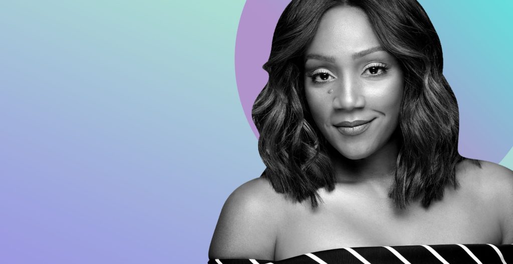 Tiffany Haddish against blue and purple background.