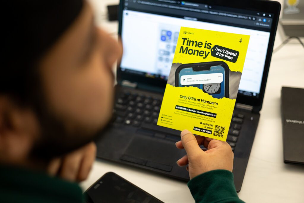  A student holding a Time is Money pamphlet