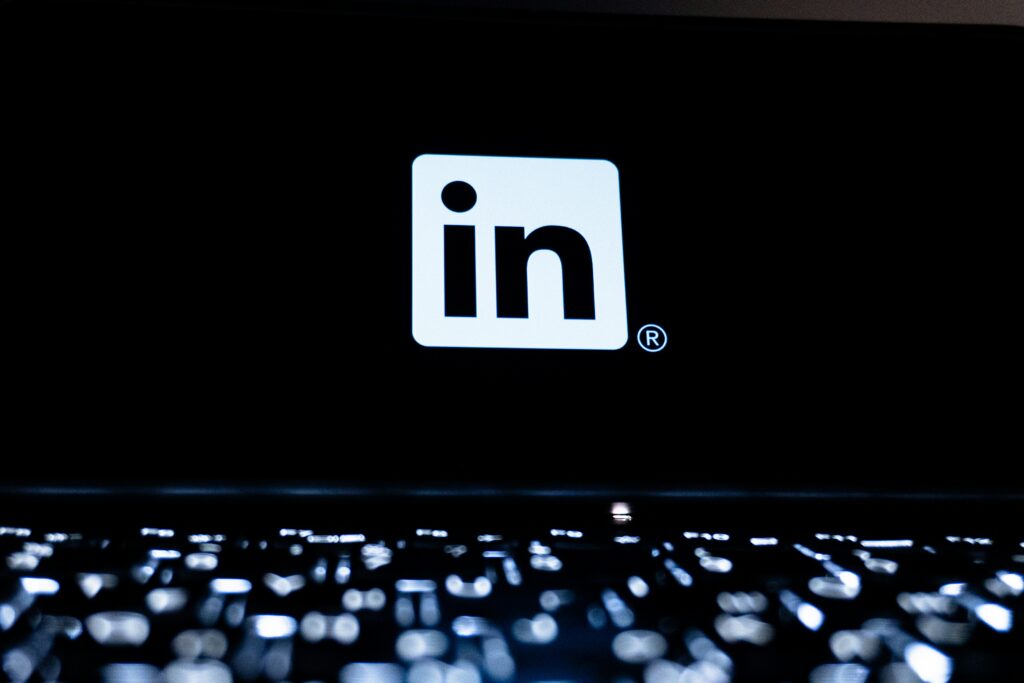 a laptop screen displaying the LinkedIn logo