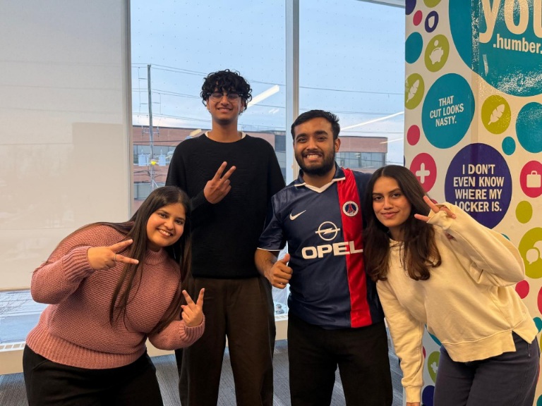 A candid photo of Jasleen Kaur with a few people from the DBSA.